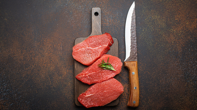 Raw top sirloin steaks